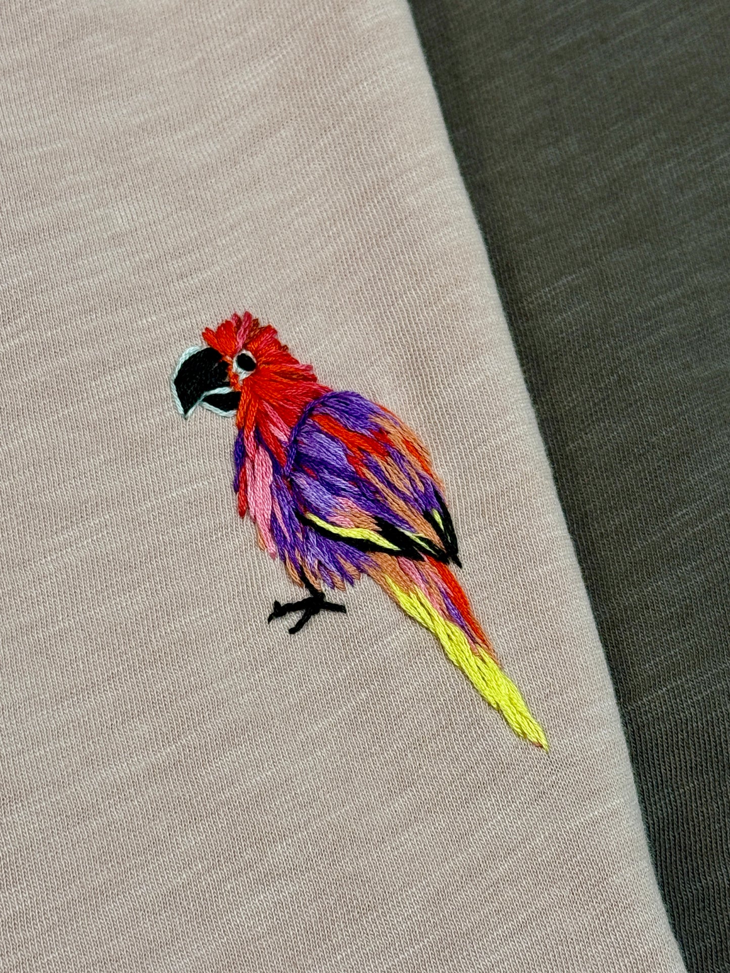 Journey Tee Coral- Moluccan Macaw