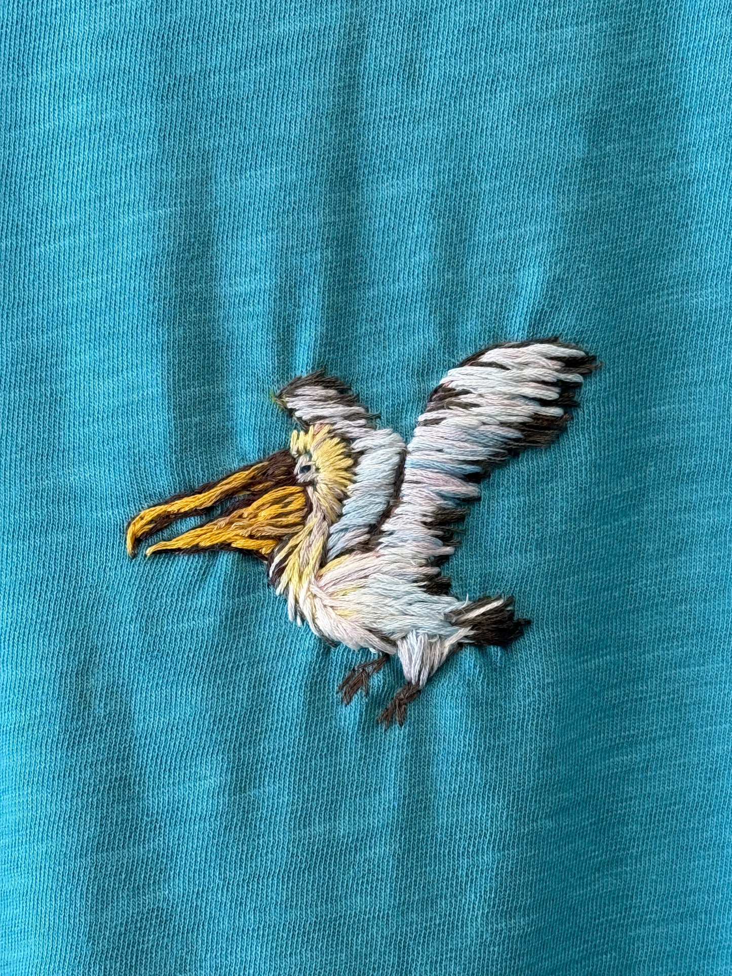 Journey Tee- Flying Pelican